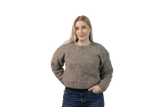 Woman wearing a brown sweater on a white background