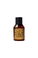 Bottle of Ilmurosjor perfume with a black cap on a white background